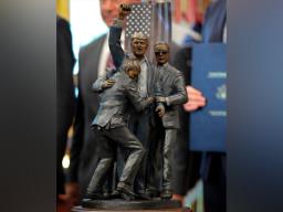 Trump installs statue depicting 2024 assassination attempt in Oval Office