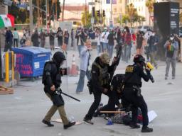 ICE raids spark protests in Los Angeles; local officials say they were left in the ..