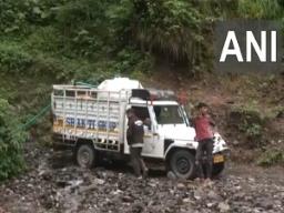 Locals rush aid in flood-hit Mandi as toll climbs to 69 in Himachal following monso..